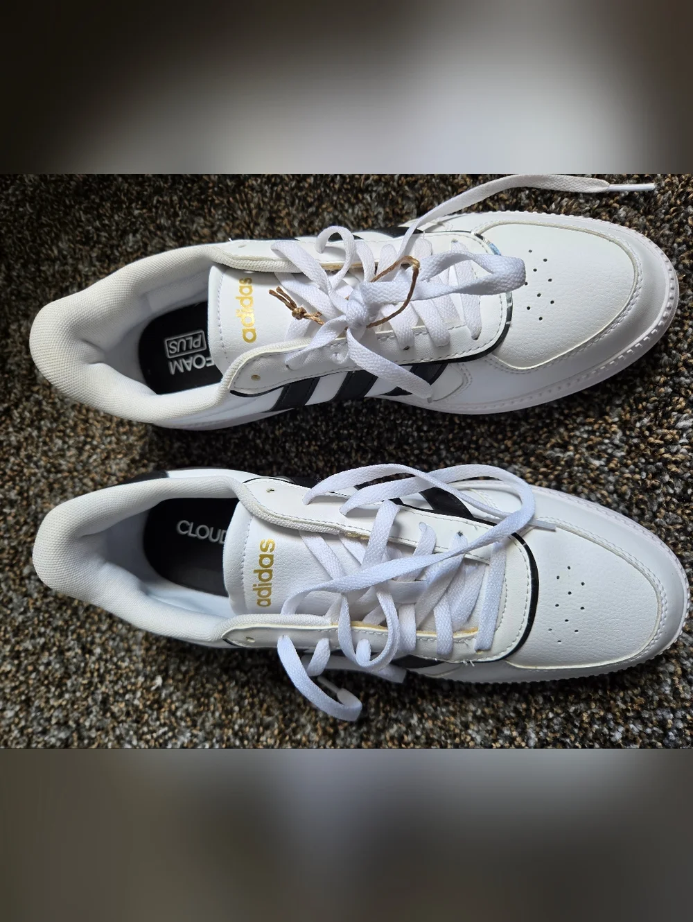 adidas Women’s White Sneakers with Black Stripes and Gold Accents